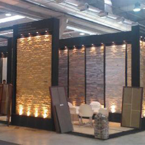 Booth with illuminated stone walls